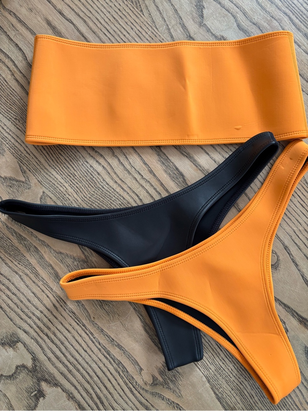 Hoaka bikini neoprene swimwear 1 top, 2 bottoms. Orange and black sz Large